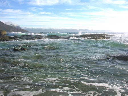 Foto Blick vom Strand auf das Meer